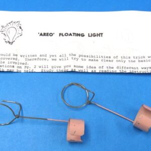 a pair of vintage e z magic areo floating light gimmicks